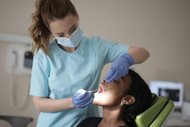 Dentist in Hale confidently Treating a nervous Patient